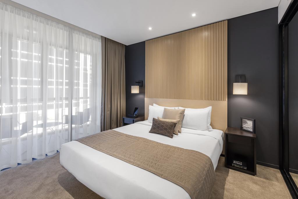 Skye Hotel Suites Parramatta Exterior photo A bedroom at the hotel