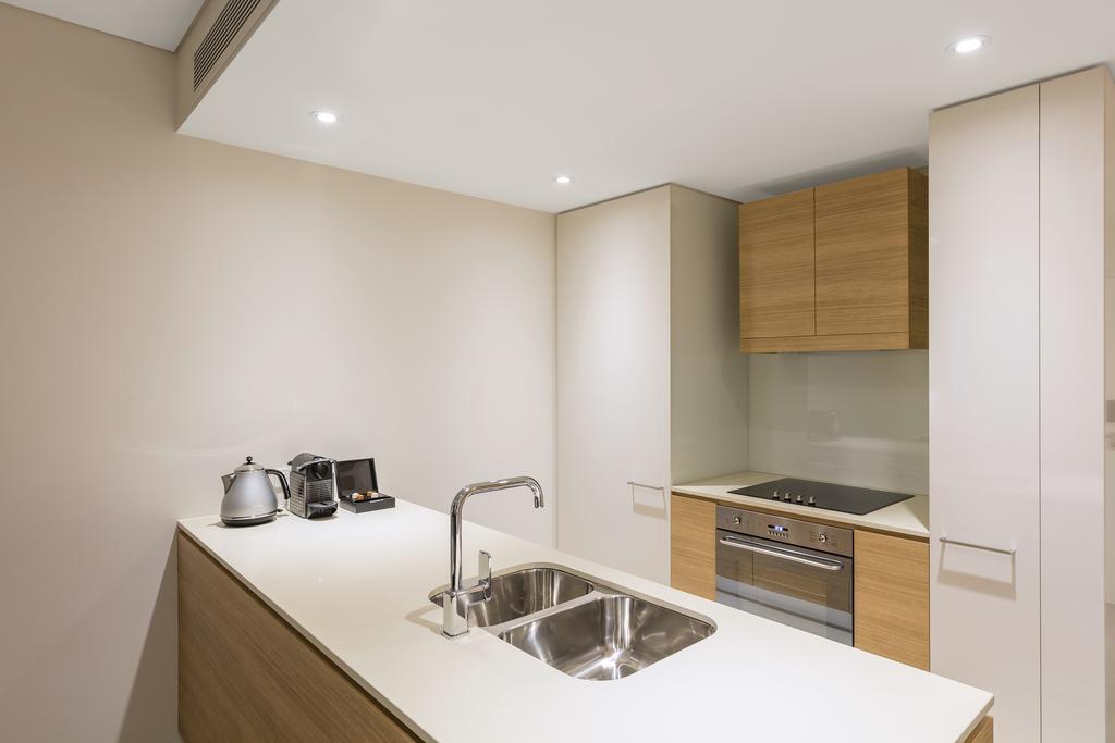Skye Hotel Suites Parramatta Exterior photo A kitchen at the apartment