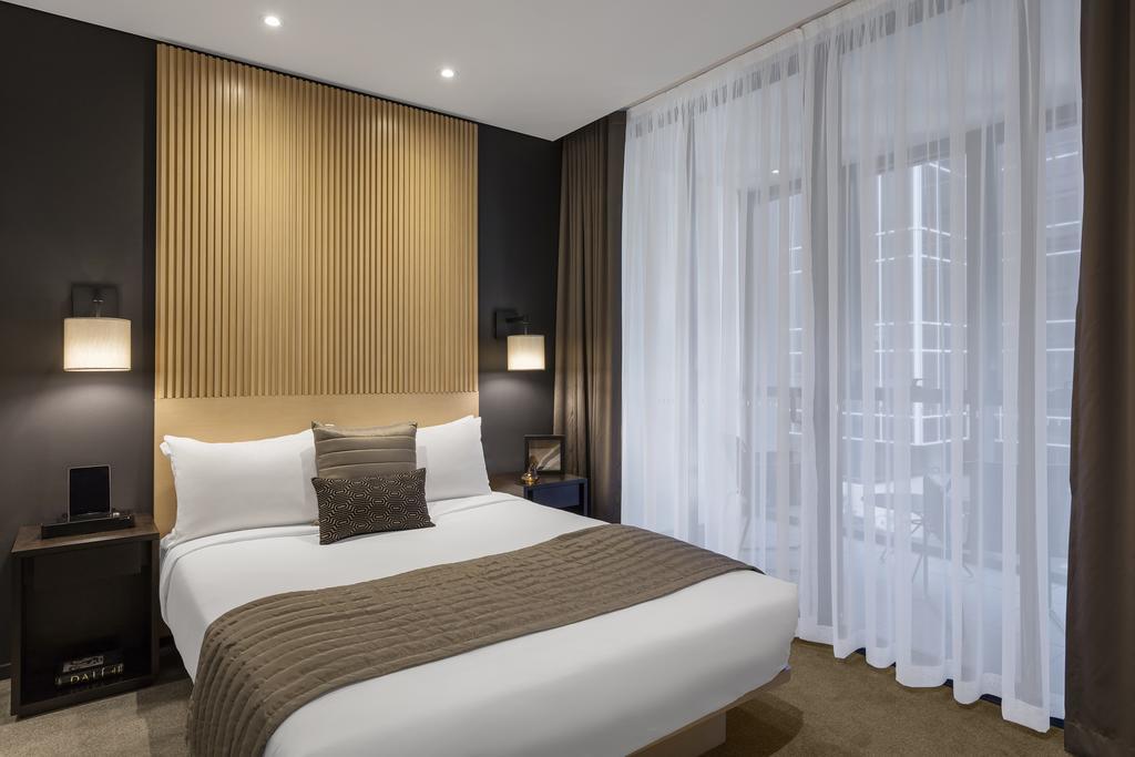 Skye Hotel Suites Parramatta Exterior photo A bedroom at the hotel