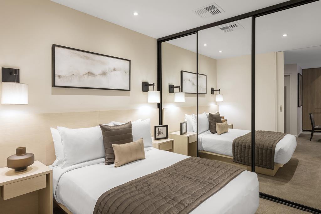 Skye Hotel Suites Parramatta Exterior photo A bedroom at the hotel